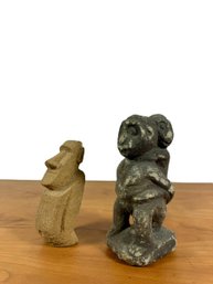 A Pair Of Weathered Stone Sculptures