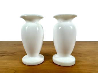 A Pair Of Polished Stone Candleholders