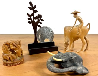 A Grouping Of Elephant Carved Figures