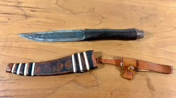 A Dagger & Sheath - Leather Wrapped Wooden Handle