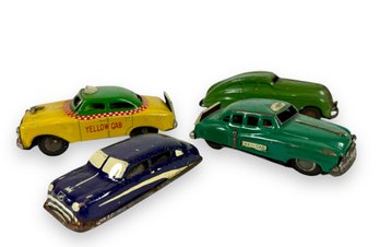 (4) Antique Tin Toy Cars