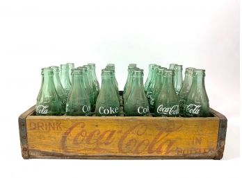 Antique Coca-Cola Bottles And Carrying Crate