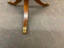 True Grand Rapids Certified Round Wooden Table With Pedestal Base And Brass Claw Feet