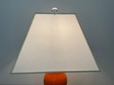 Orange Table Lamp With Lucite Base And An Elegant Rectangular Linen Shade