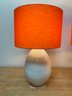 Pair White Lamps With Bright Orange Barrel Shades