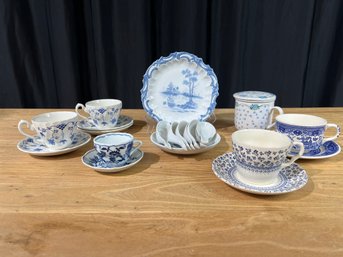 Blue And White Cups And Saucers