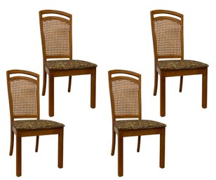Four Cane Backed Dining Chairs With Upholstered Seats