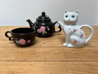 Two Adorable Teapots