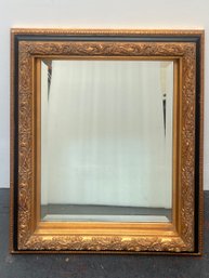 Framed Black And Gold Ornate Mirror