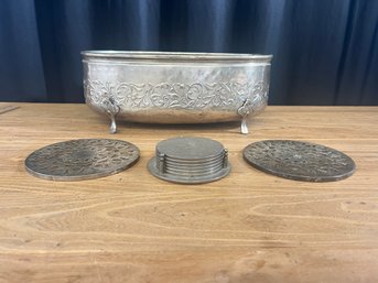 Silver Oval Bowl, Trivets And Coasters