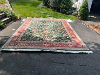 Green And Red Fringed Rug