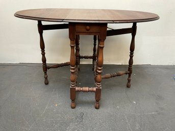 Swing Leg  Dropleaf Table With Single Drawer