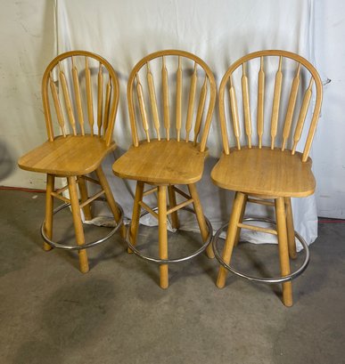 Set Of Three Oak Swivel Counter-stools