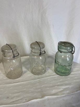 Three Glass Mason Jars With Lids