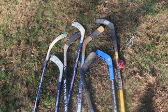 USED STREET & ICE HOCKEY STICKS