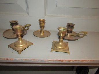 COLLECTION OF BRASS CANDLE STICK HOLDERS