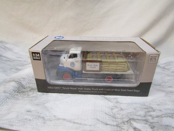 BLUE SEAL FEED GMC SNUB NOSE HALF STAKE TRUCK 1:34 SCALE