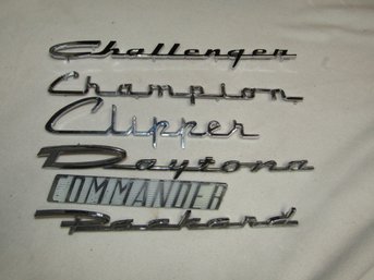 COLLECTION OF STUDEBAKER EMBLEMS BADGES