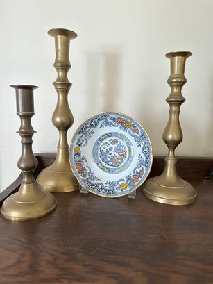 One Decorative Plate And 3 Brass Candlesticks