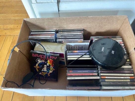 Box Of CDs & Disc Player
