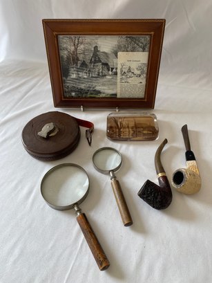 Frame, Pipes, Paperweight, Tape Measure, Magnifying Glasses
