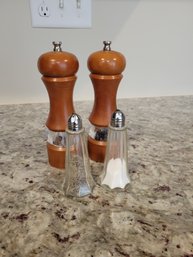 Two Sets Of Salt And Pepper Shakers