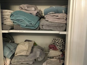 Two Shelves Of Towels