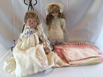 Two Bisque Dolls And A Few Baby Blankets