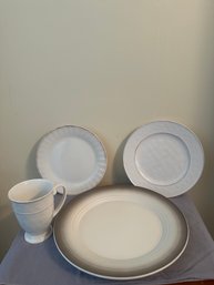 Three Decorative Plates And A Mug