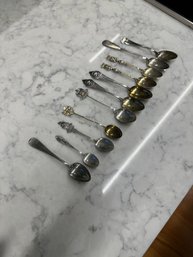 11 Sterling And Unmarked Souvenir Spoons