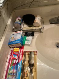 New Tooth Brushes, Floss, First And Bandages.