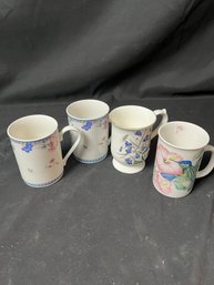 4 White W/ Floral Design Coffee Cups