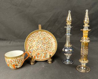 (2) Vintage Perfume Bottles And A Tea Cup With Plate. (LD)