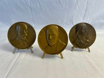 3 Brass Coins On Stands