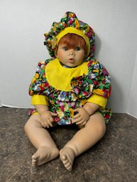 Large Lifesize Hard Plastic Baby Doll In Floral Outfit