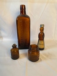 4 Vintage Amber Colored Glass Bottles