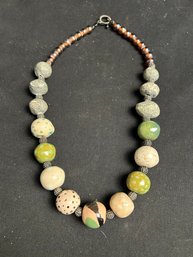 Eclectic Necklace Featuring Beads & Stones In Unique Patterns