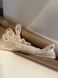 Roll Of Brown Paper And Rope