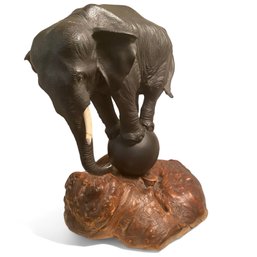 Elephant Brass Statue On Burled Wood