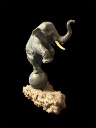 Elephant On A Ball Statue (LD)