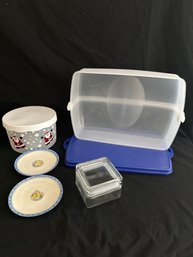 Cupcake Container, 2 Small Plates, A Glass Container, And A Christmas Cookie Container.