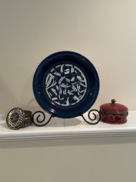 Decorative Plate, Porcelain Jar, And A Candle