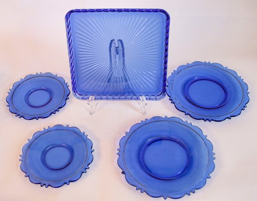 Group Of Blue Plates And Sugar And Creamer