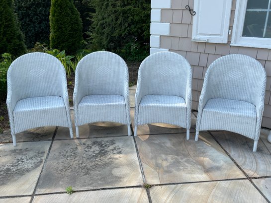 Set Of Four White Wicker Outdoor Armchairs