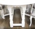 Antiqued White Painted Oval Drop Leaf Table With 8 Grey Leather Upholstered Antiqued White Chairs