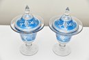 Pair Of Glass And Blue Covered Urns