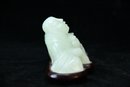 Carved Jade Buddha On Wood Stand Purchased On Hong Kong