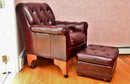 Oxblood Button Tufted Armchair On Wheels With Footrest