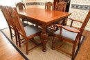 Jacobean Style Carved Oak Dining Table And Six Chairs