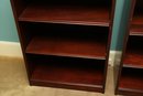 Pair Of Bookcases With Adjustable Shelves And Gold Inlay